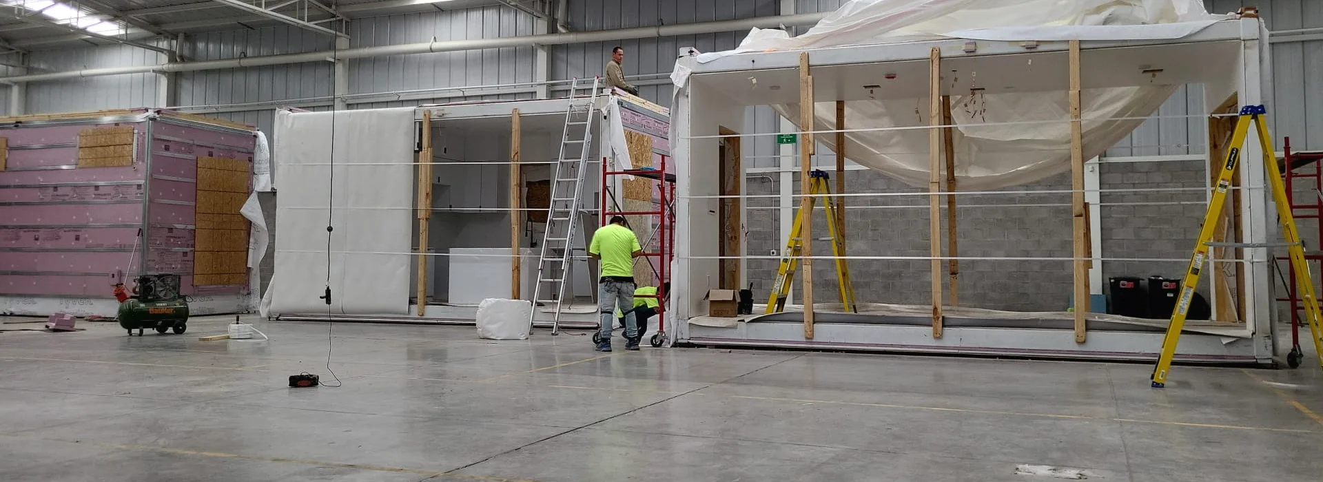 Three Olerra Flex-Flat modules side by side on the factory production line